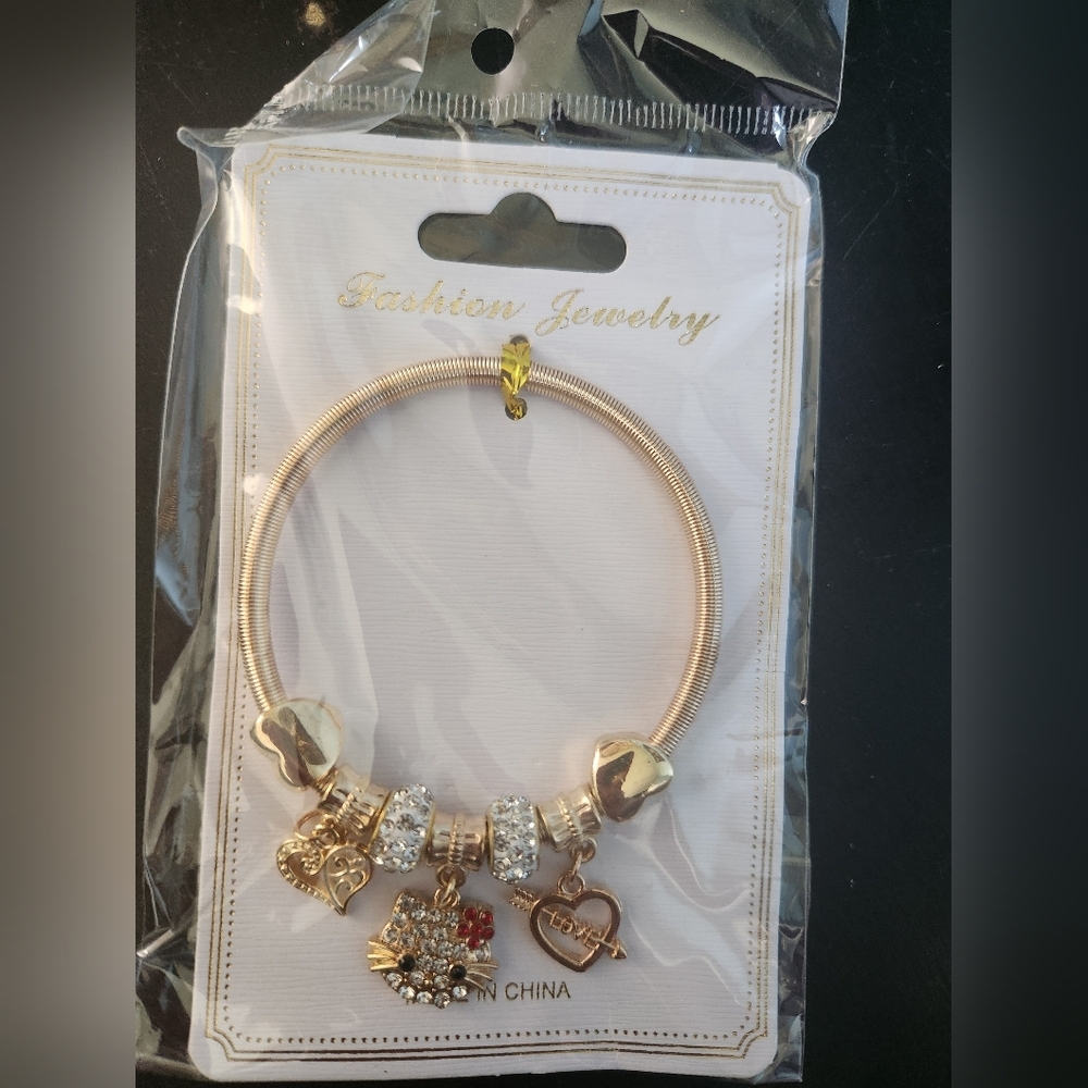 Gold and Silver Charm Bracelet